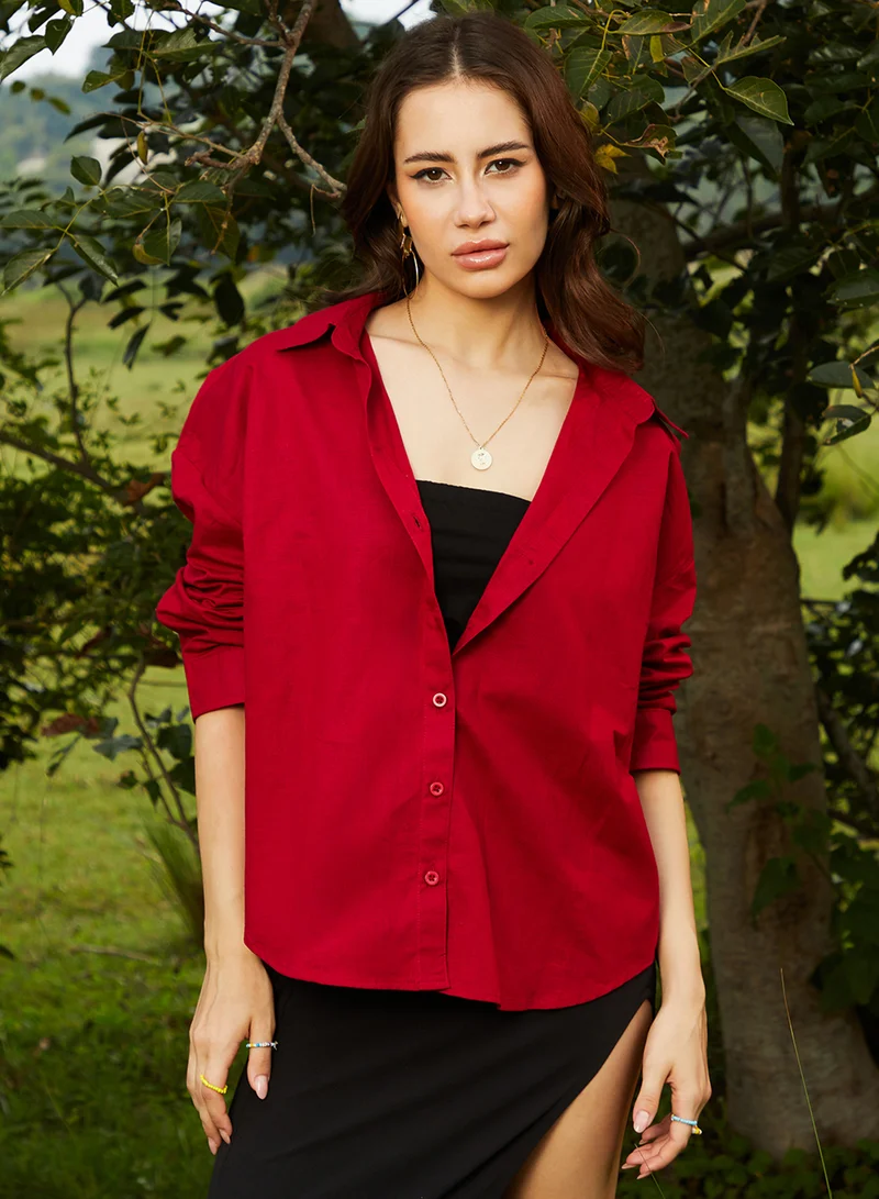 كامبوس سوترا Women's Crimson Red Solid Oversized Shirt For Casual Wear | Spread Collar | Long Sleeve | Button Closure | Oversized Shirt Crafted With Comfort Fit For Everyday Wear